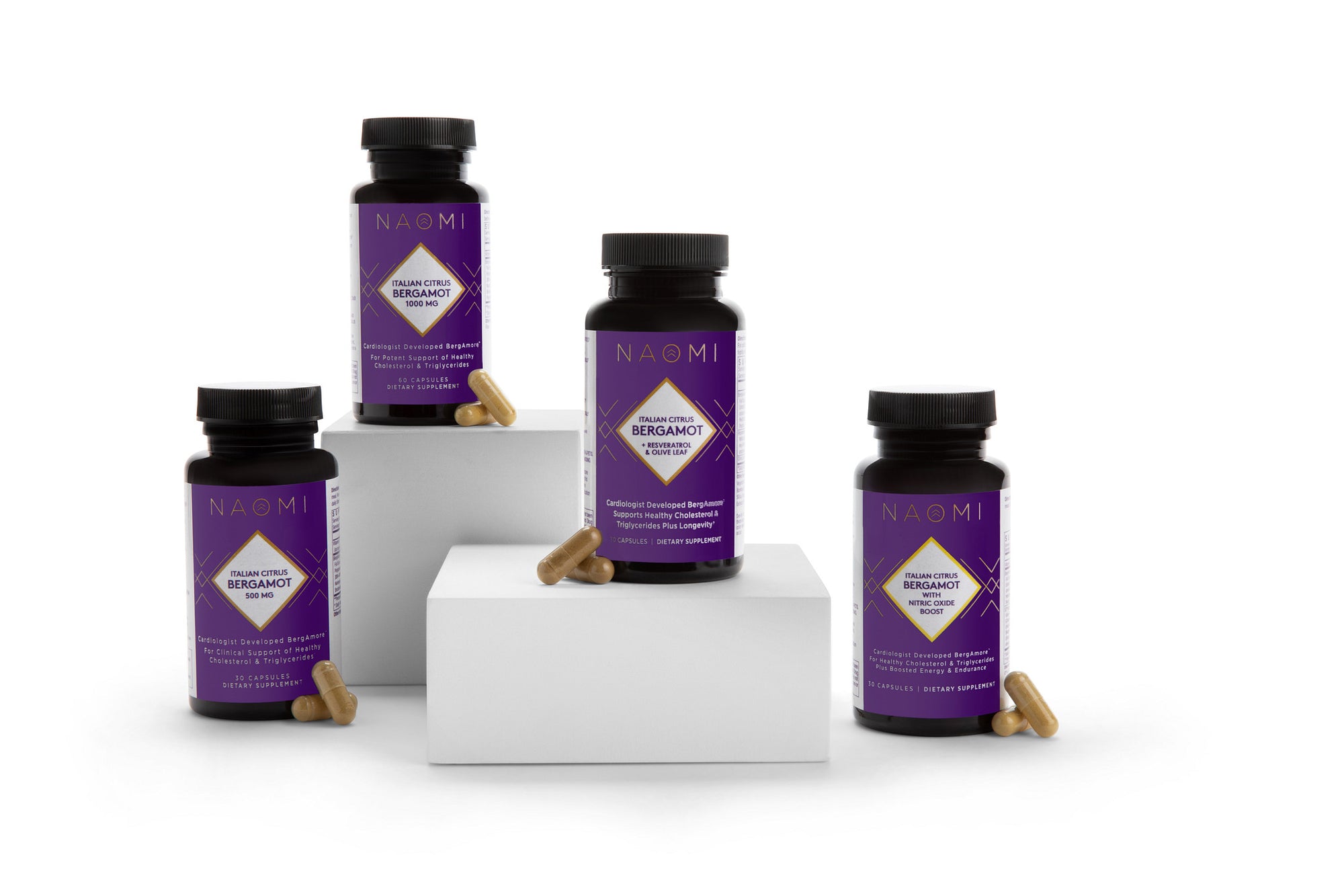 Collection of NAOMI supplement bottles on a white background