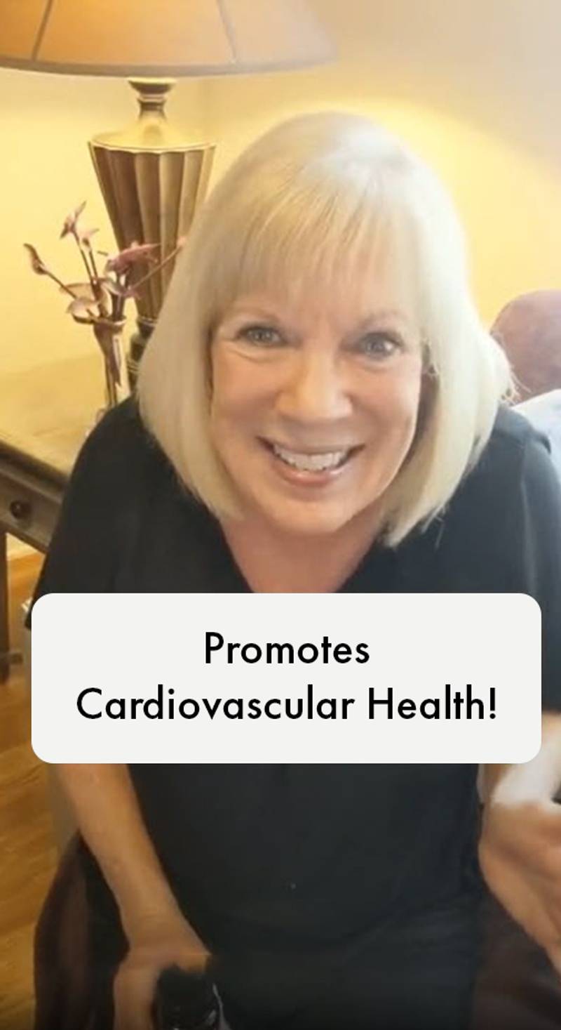 Woman with text 'Promotes Cardiovascular Health!' in a home setting
