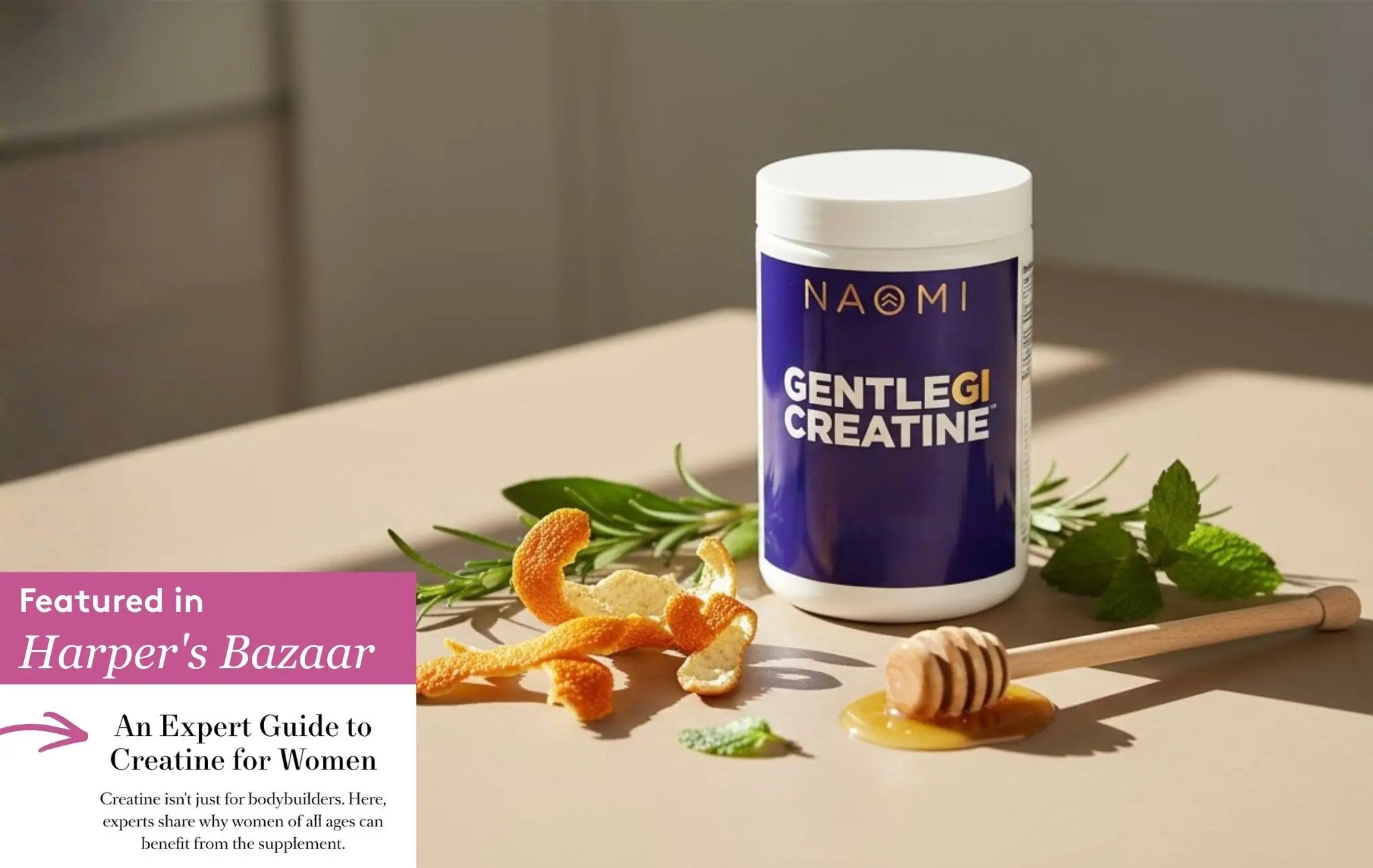 Naomi Gentlegi Creatine supplement container on a table with honey and leaves.