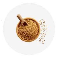 Brown powder in a bowl with a wooden scoop on a white plate