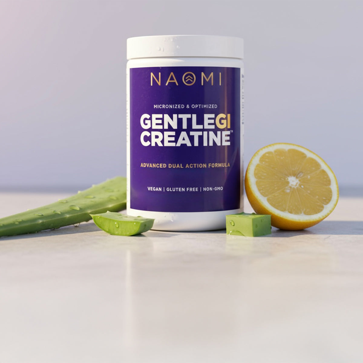 Container of Naomi GentleGI Creatine with a lemon and aloe vera on a light background