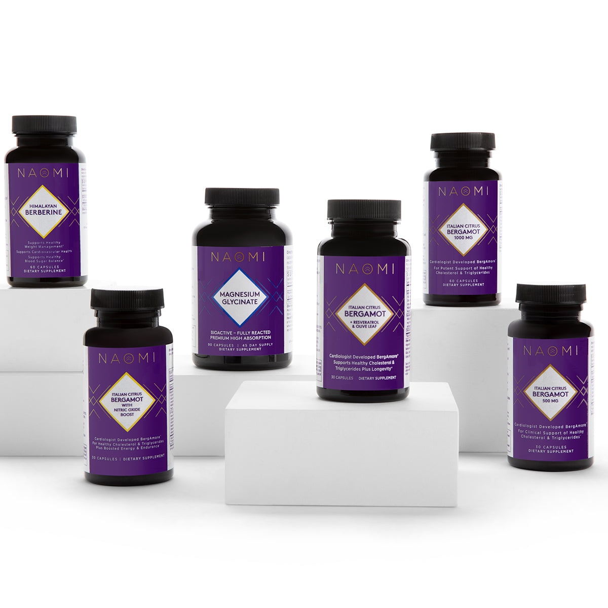 Collection of NAOMI supplement bottles on a white background