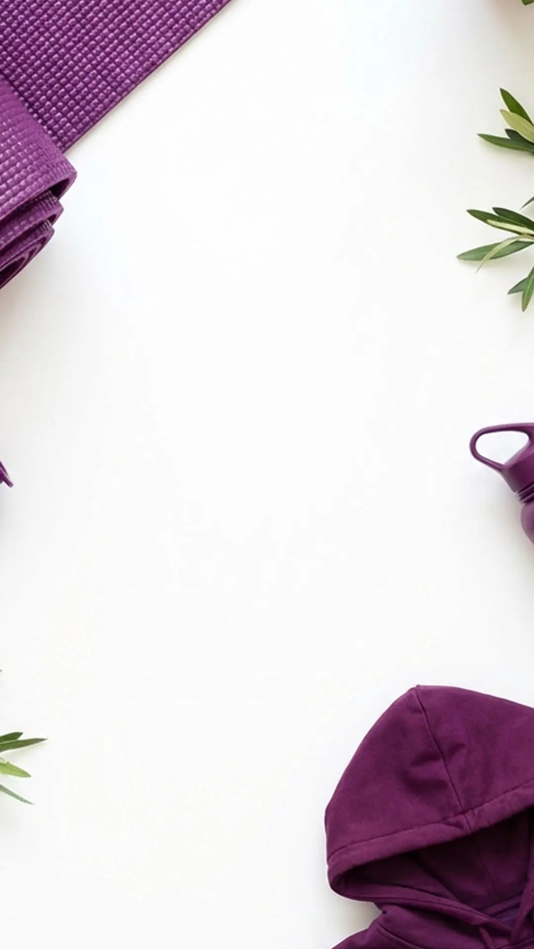 Purple yoga mat and hoodie on a white background with green leaves.